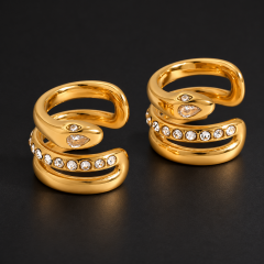Goldfarbene Damenohrringe mit funkelndem Strass und Augenmuster