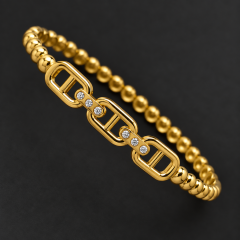 Goldfarbener Armreif mit Strasssteinen im geometrischen Rechteck-Design